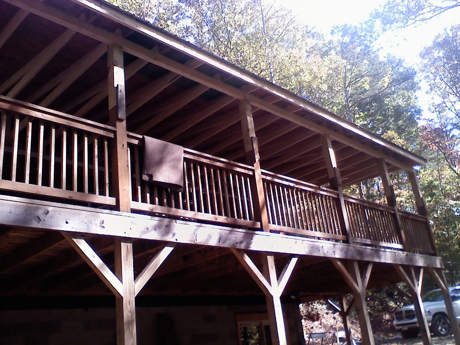 Timber framing under a new elevated porch and deck — Roof Leak Repair in Unadilla by Roofing Brothers